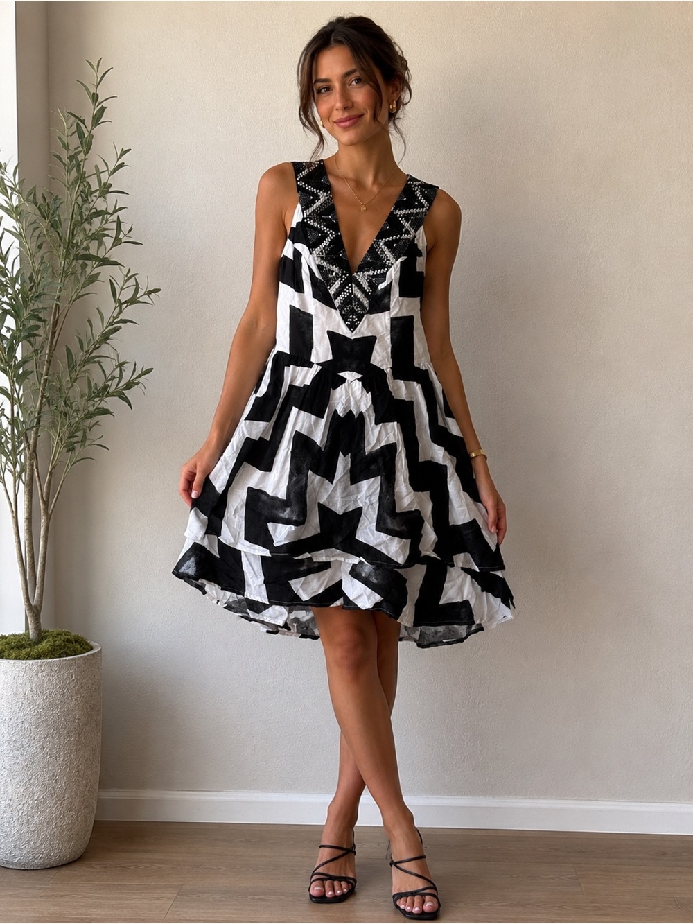 bebe Black and White Geometric Sleeveless Mini Dress with Beaded V-Neck